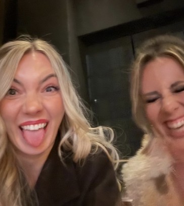 Friends laughing at night