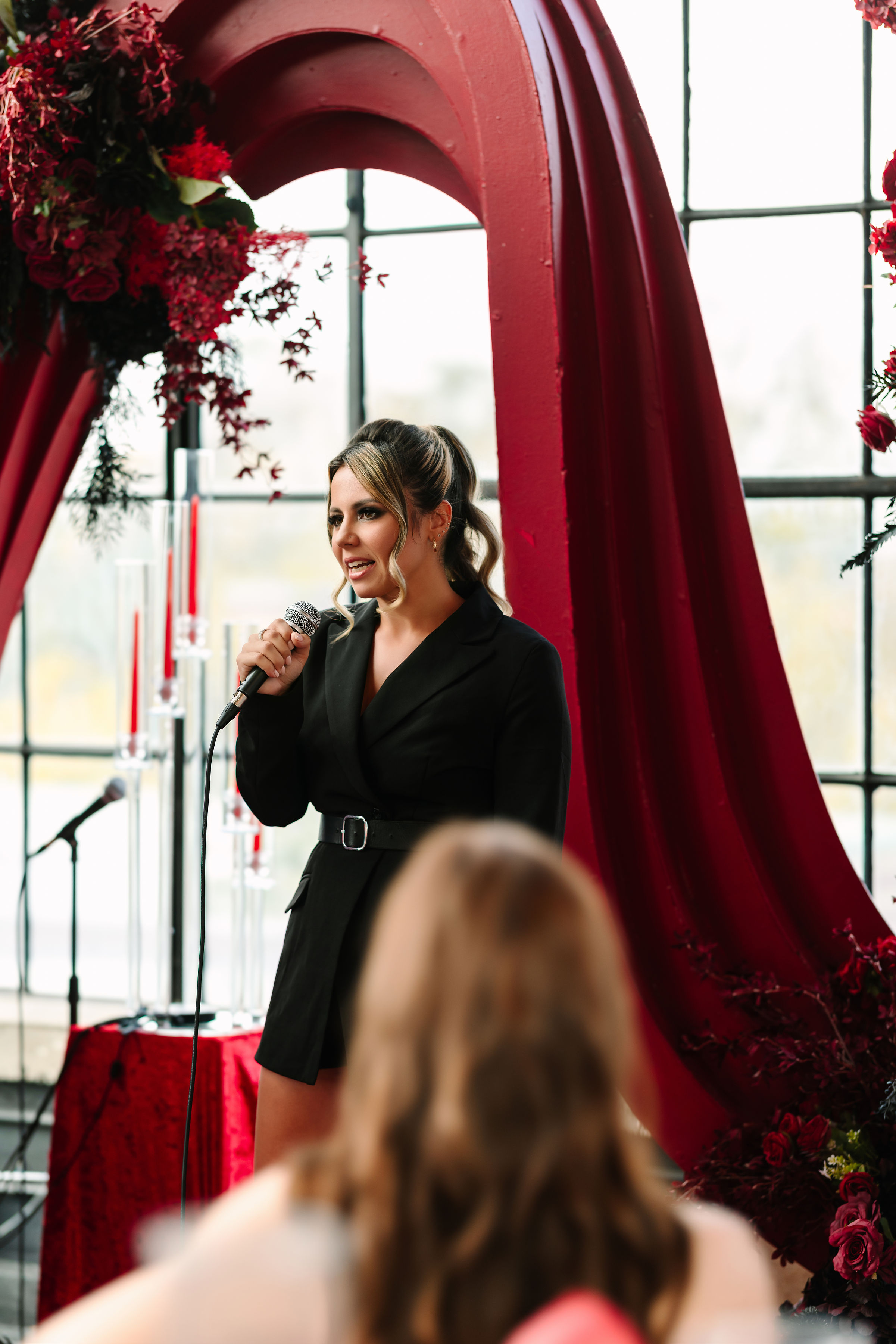 Maddie speaking on stage